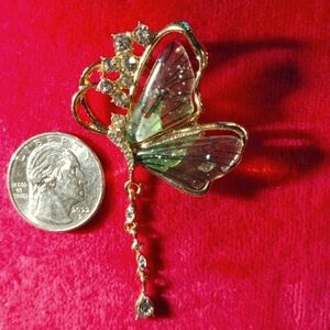 Gold plated, w/rhinestones & a melted green plastic ,butterfly brooch